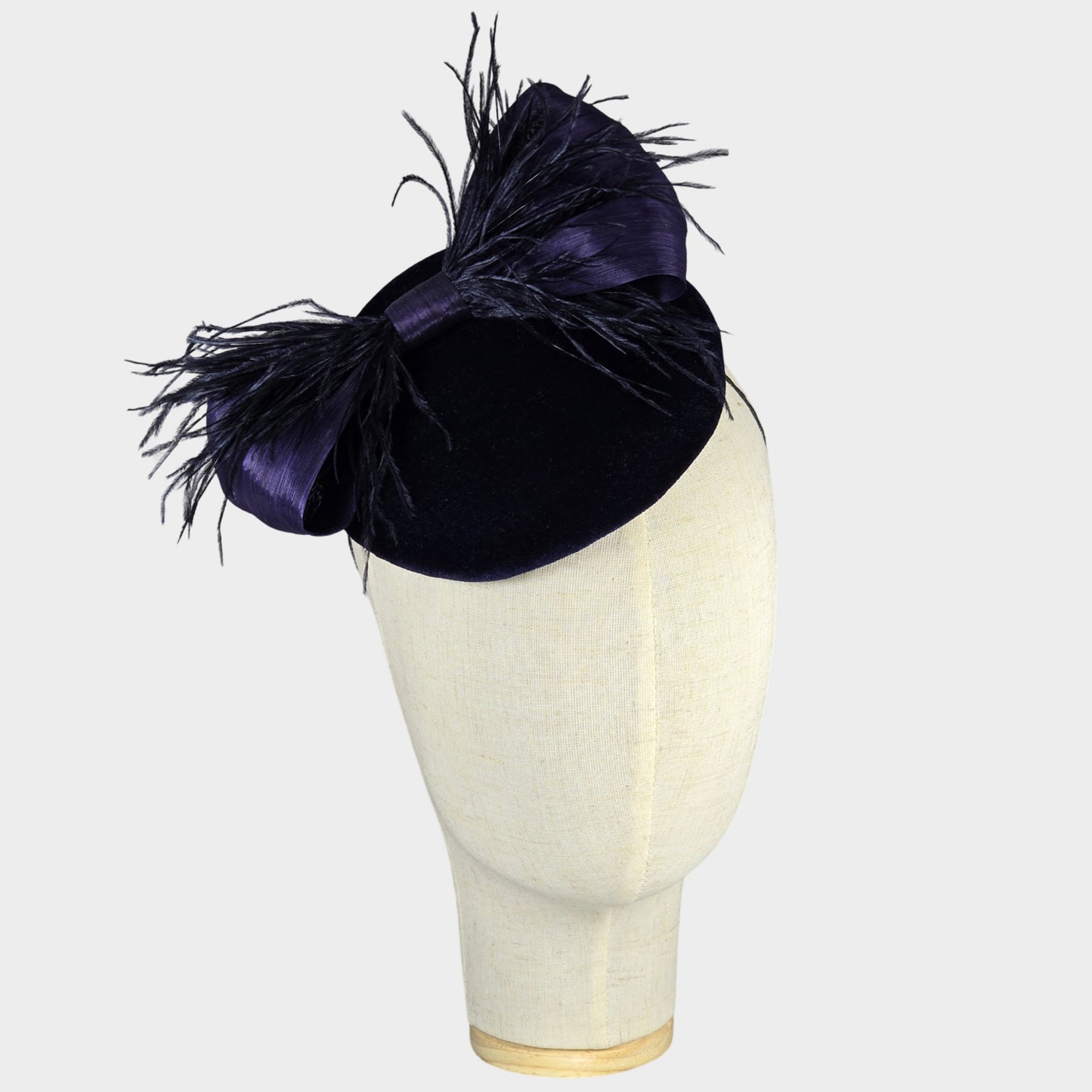 Navy velvet pillbox hat with ostrich feathers bow