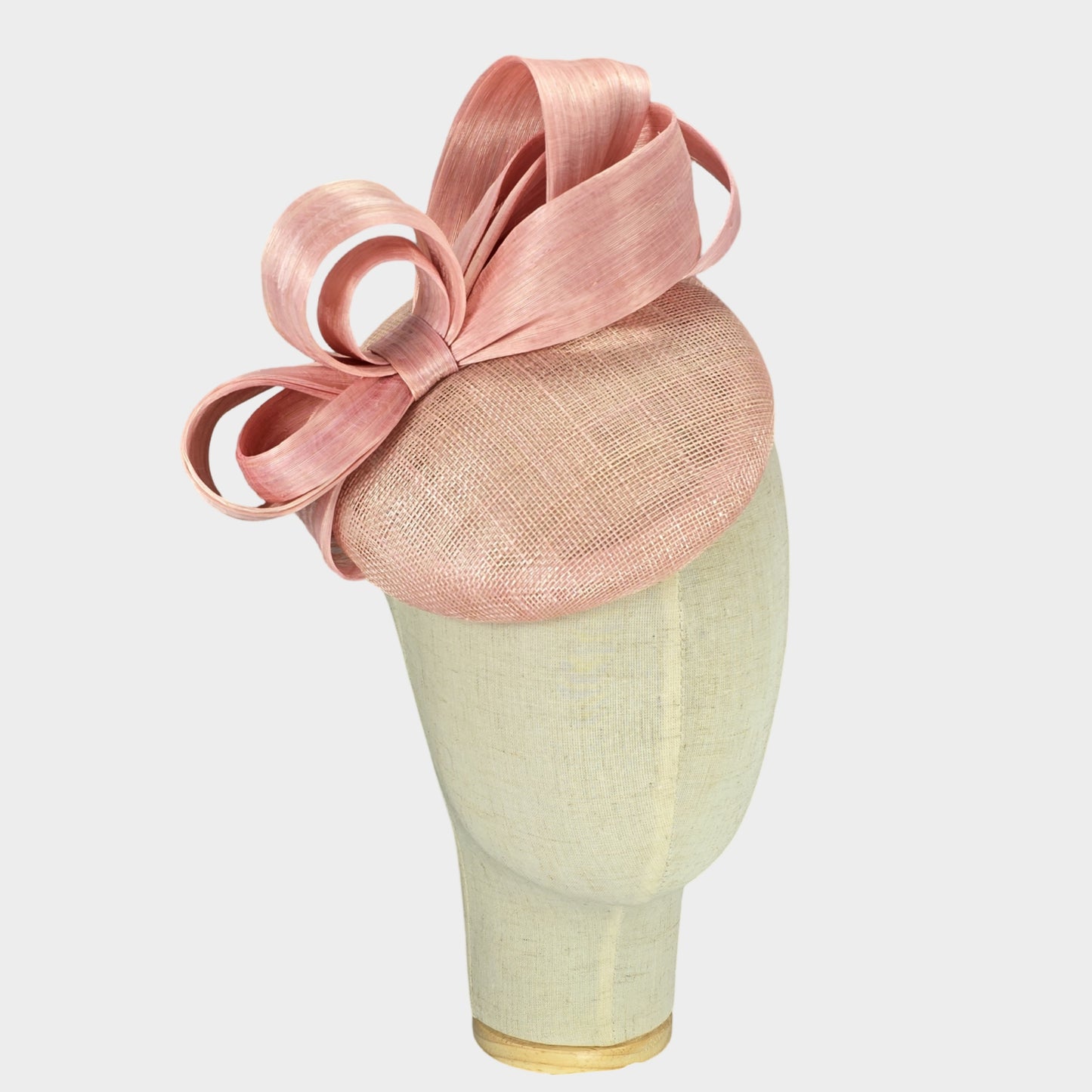 Pale pink pillbox hat with abaca silk bow