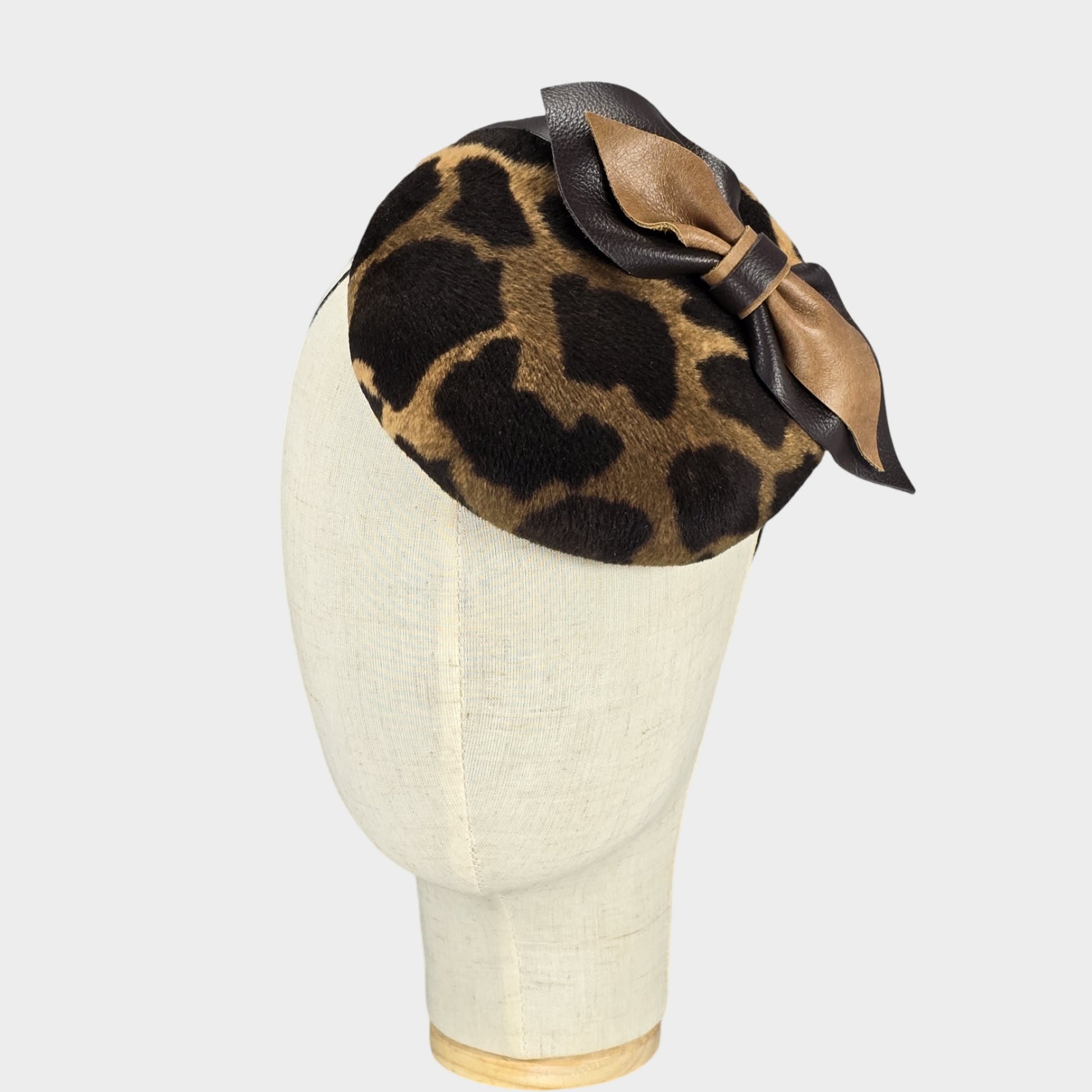 Leopard print velvet pillbox fascinator with leather bow