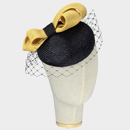 Natural straw black and yellow pillbox hat with veil