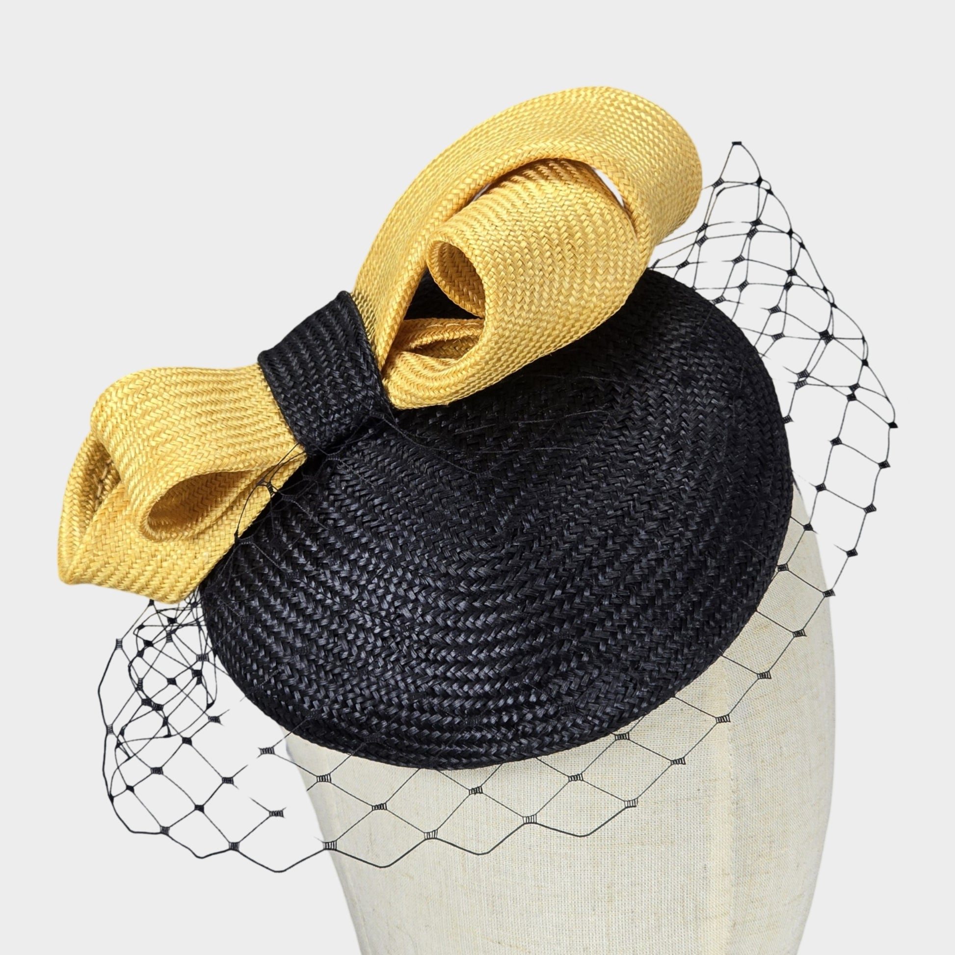 Natural straw black and yellow pillbox hat with veil