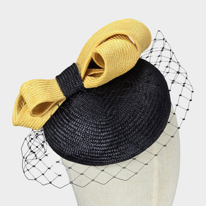 Natural straw black and yellow pillbox hat with veil