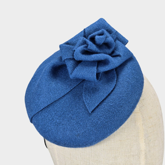 Blue felt button shaped pillbox hat