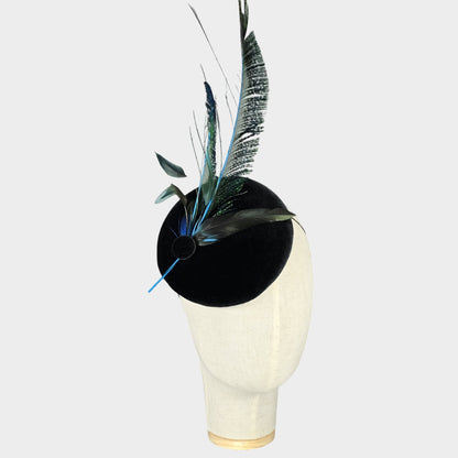 Dark green velvet pillbox hat with peacock swords