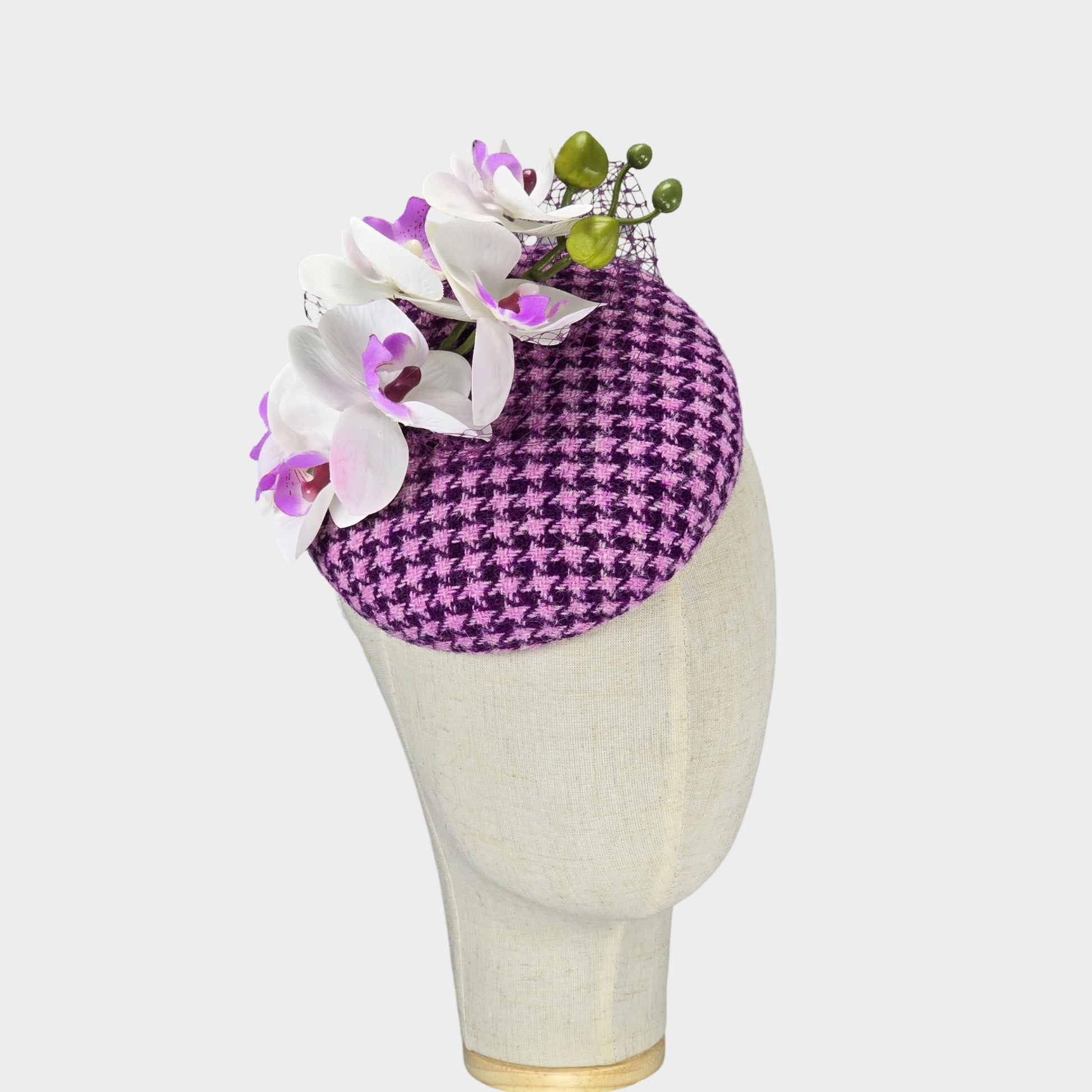 pink and purple pillbox fascinator with orchid flowers