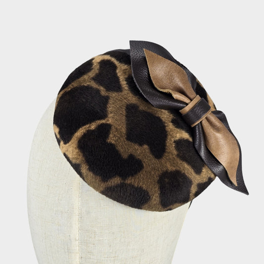 Animal print velvet pillbox fascinator with leather bow