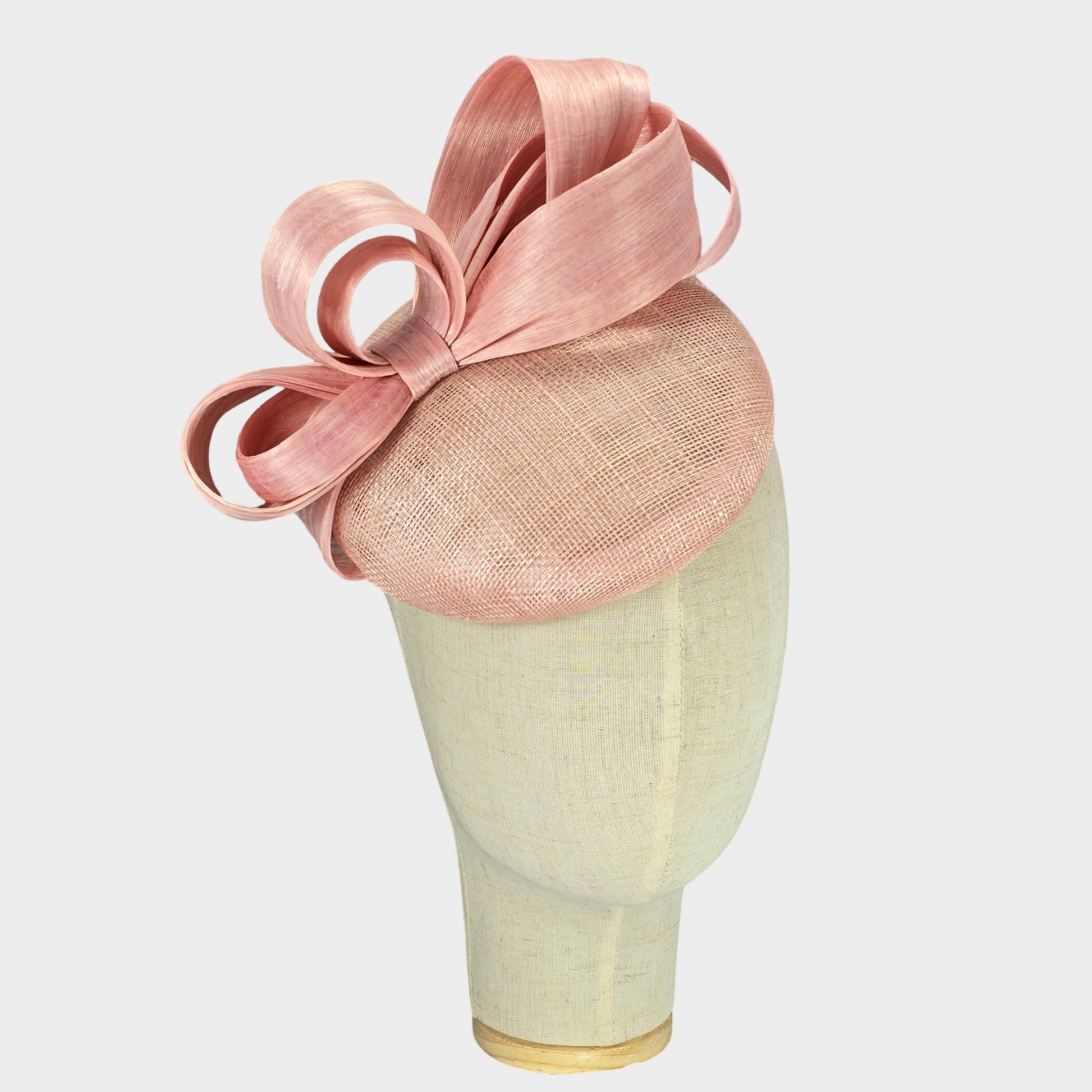 Pale pink pillbox hat with abaca silk bow