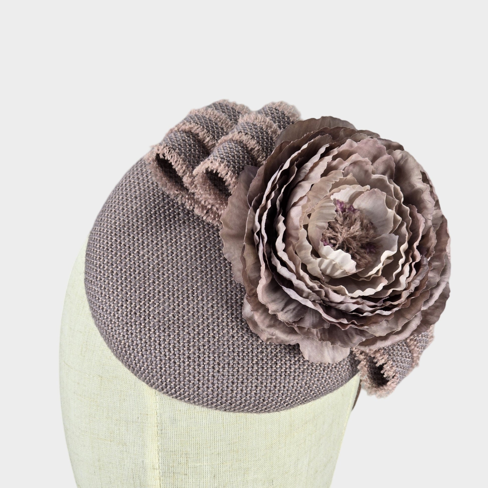 Mauve and old rose pillbox hat with flower