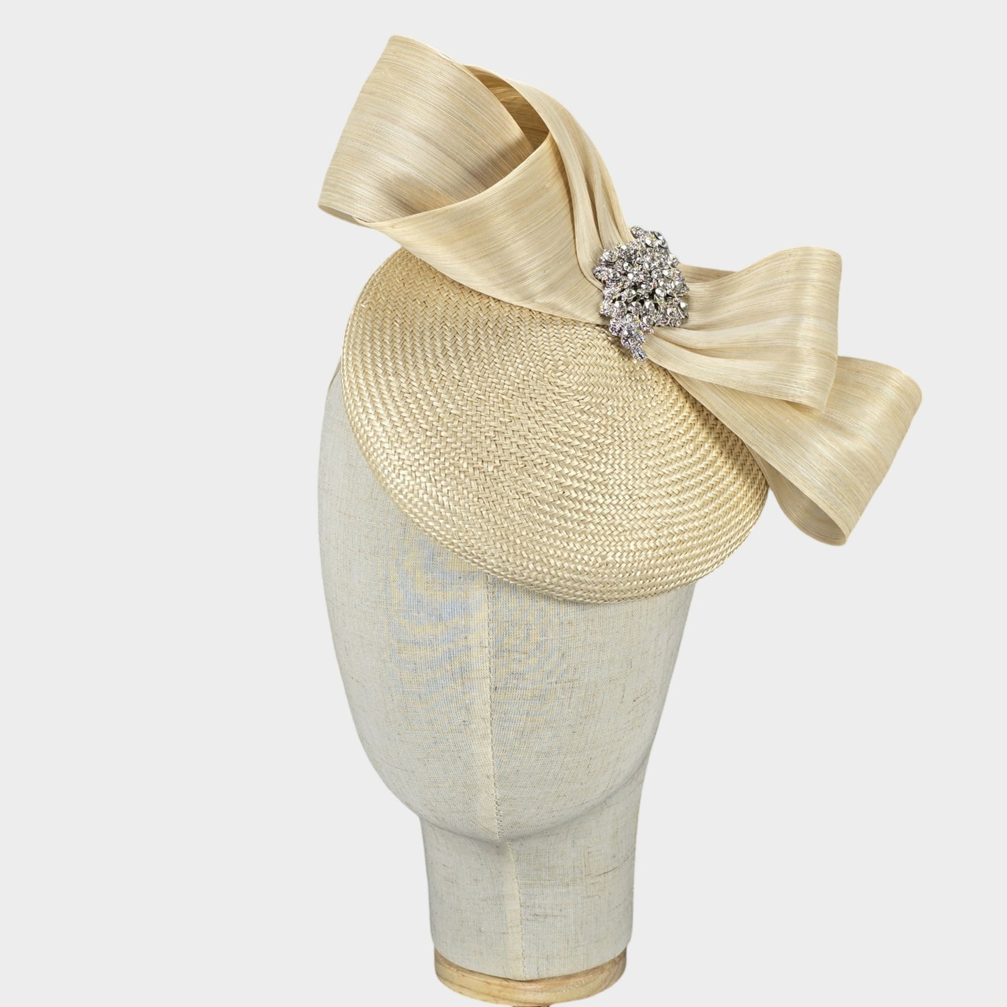 Champagne cream straw pillbox hat with abaca silk bow